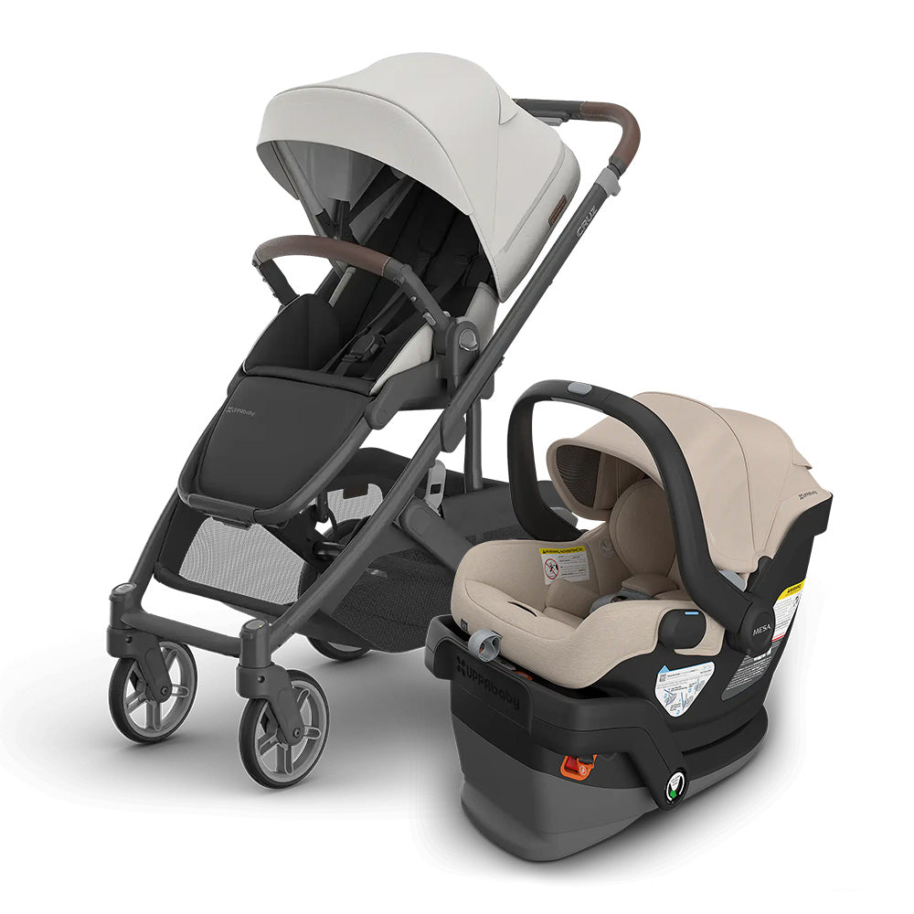 UPPAbaby Cruz V3 Stroller + Mesa V3 Infant Car Seat Travel System in beige, with car seat attached for on-the-go.