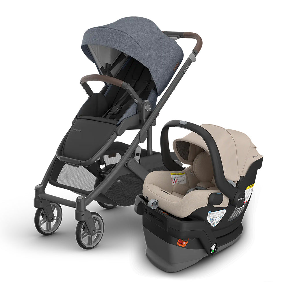 Uppababy Cruz V3 Stroller and Mesa V3 Infant Car Seat Travel System in gray/beige, car seat attached to base.