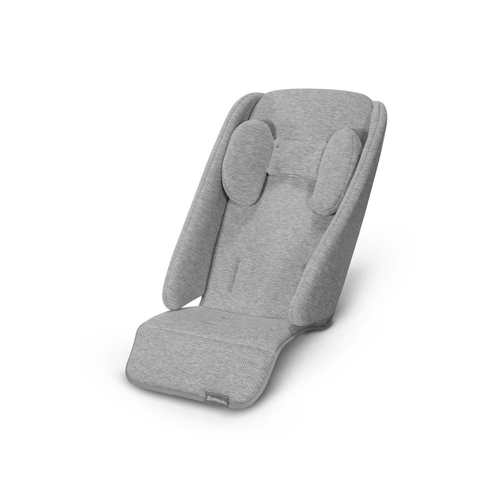 Uppababy Infant Snugseat in grey fabric with cushioned head and side supports