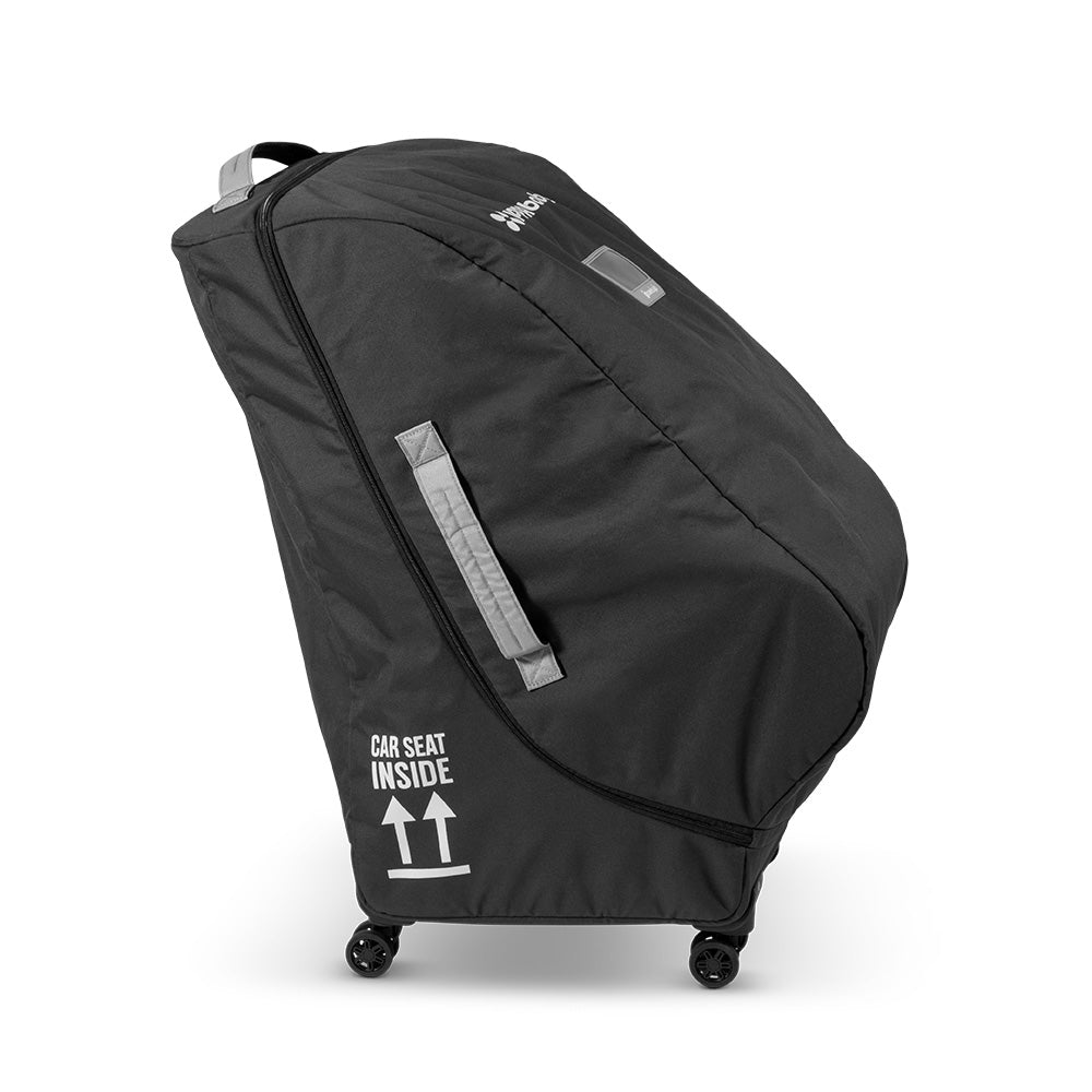 Uppababy Knox/Alta Travelsafe travel bag in black with wheels and gray carry straps