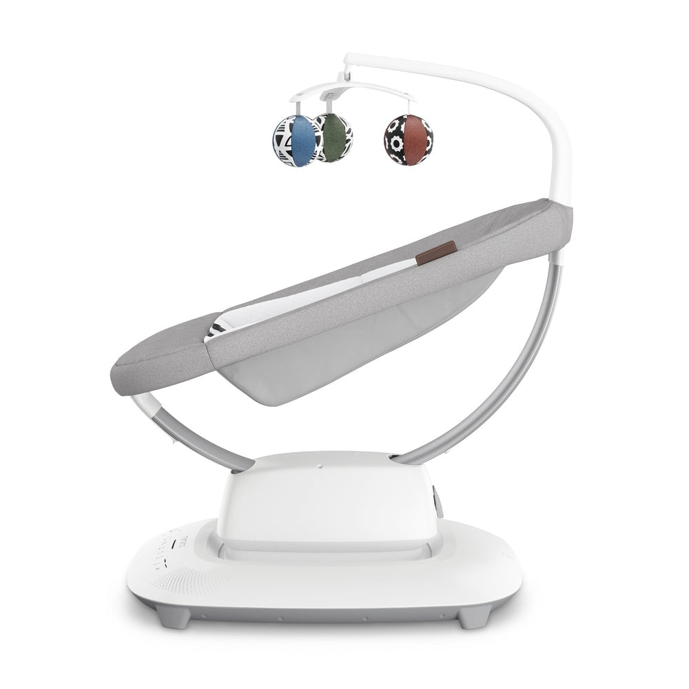 Uppababy Mamaroo Smart Swing with gray fabric seat, white frame, and three hanging patterned toys