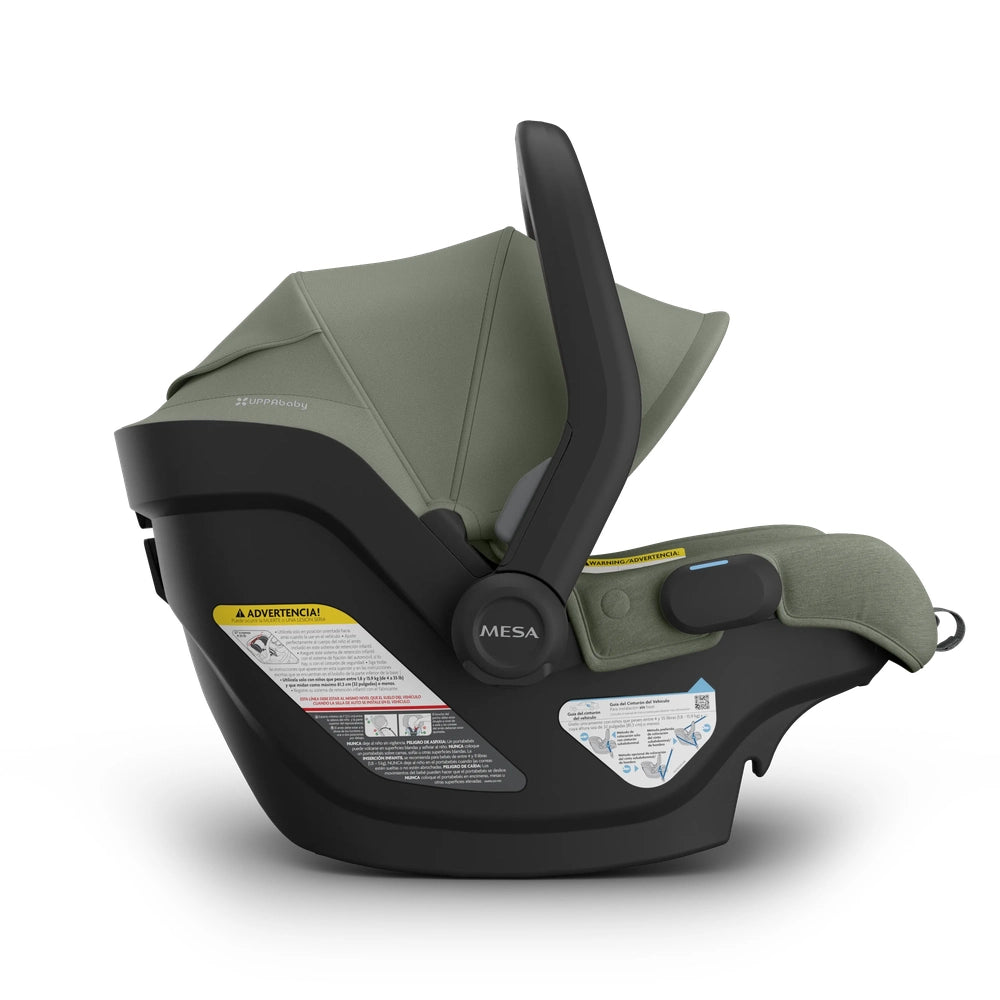 UPPAbaby Mesa V3 Infant Car Seat in olive green attached to its black base with an upright carry handle.