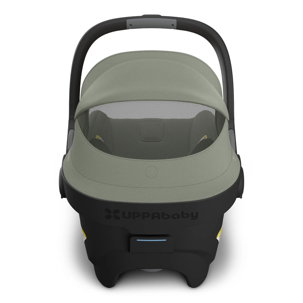 UPPAbaby Mesa V3 infant car seat in sage green with curved carrying handle and black base.