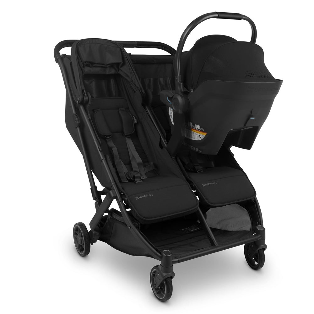 Uppababy Minu Duo Stroller in black with twin seats and car-seat adapter securely attached.