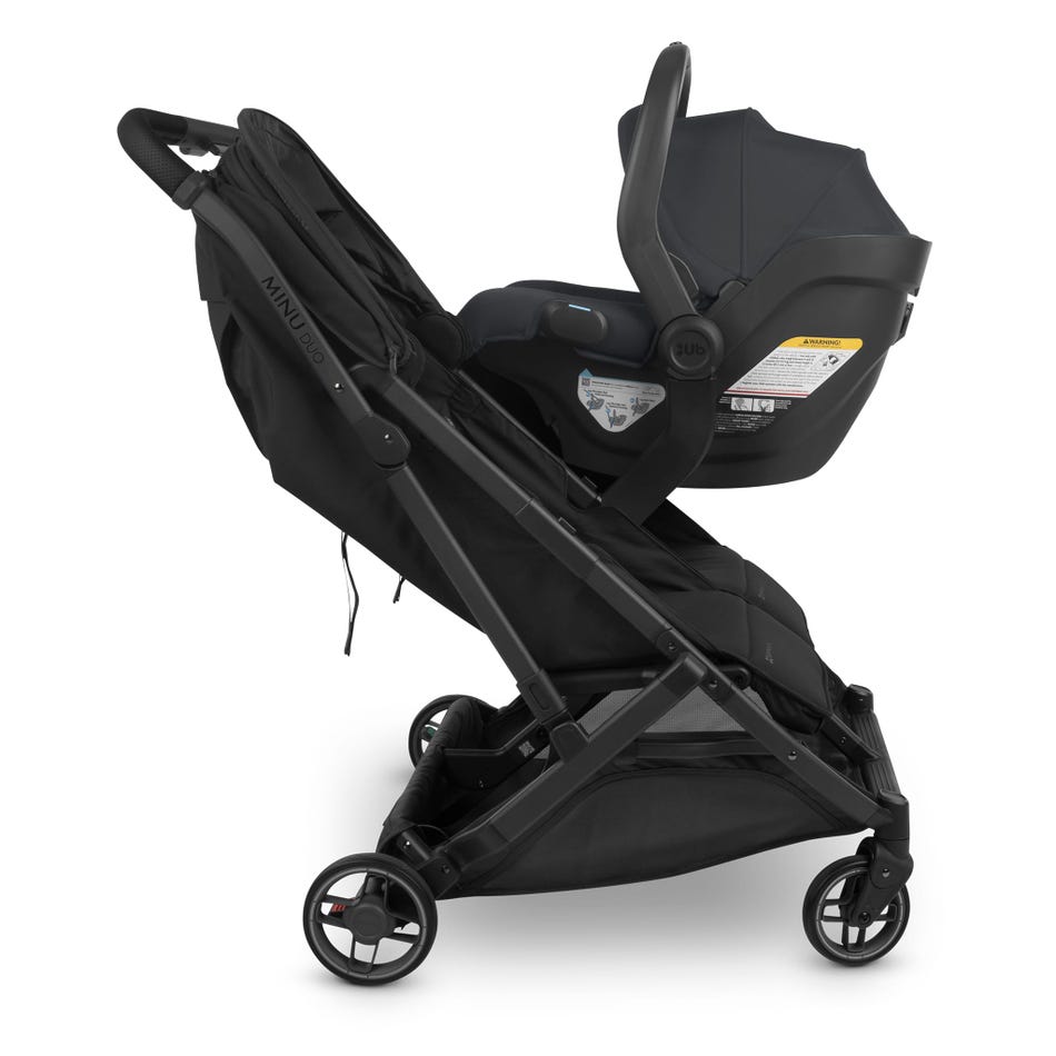 UPPABABY Minu Duo stroller in black with an infant car seat attached, showing a streamlined frame and rear wheels.