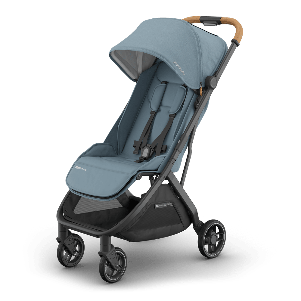 Uppababy Minu V3 stroller in blue fabric, tan handlebar, and black frame
