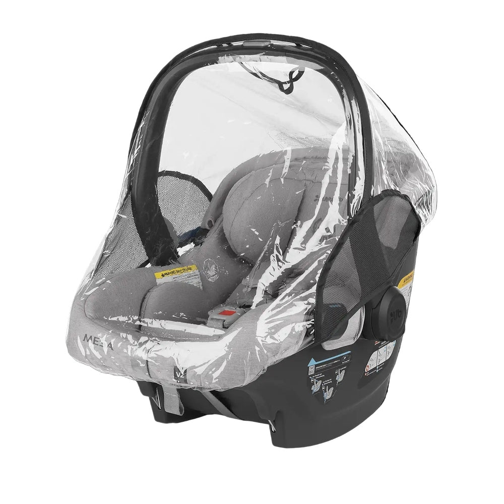 Uppababy Rain Shield for Aria and Mesa (All Models) envelops a cozy infant car seat with a clear waterproof canopy.