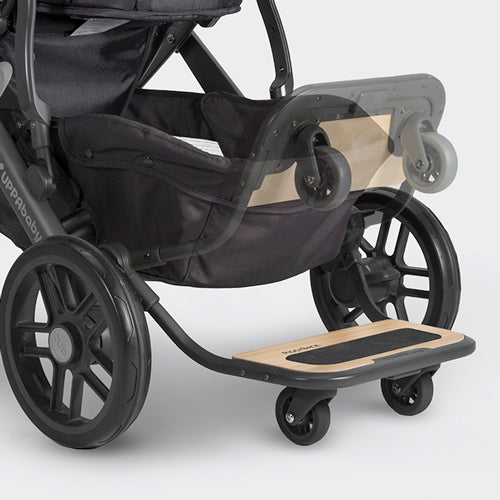 UPPABABY Vista Piggyback Ride-Along Board on stroller, wooden footboard extended for a child, small wheels.
