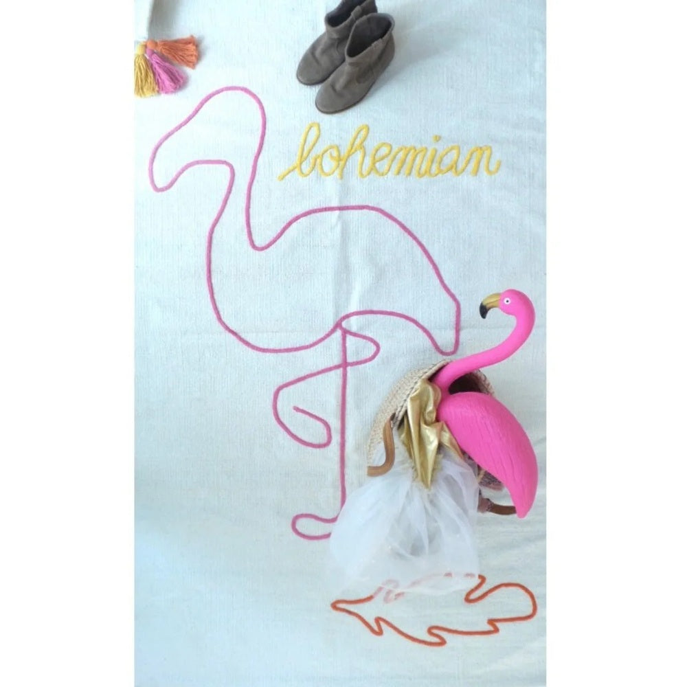 Varanassi hand-woven cotton dhurrie rug in bohemian style with a pink flamingo outline and tassels