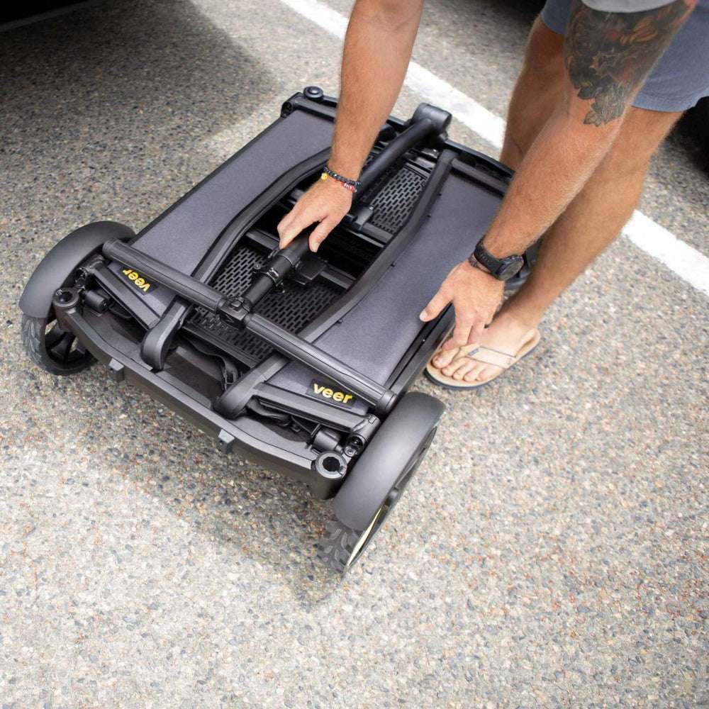 Veer All-Terrain Cruiser XL Wagon in compact folded black frame with VEER yellow logo