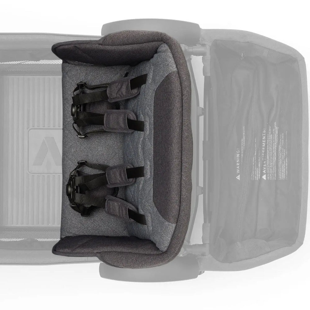 VEER Comfort Seat in gray fabric strapped to stroller with five-point harness for secure ride.