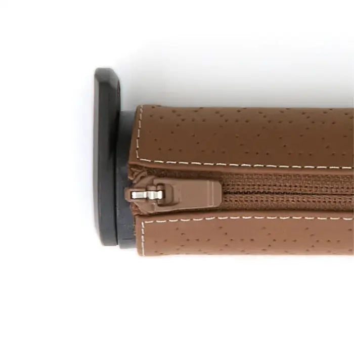 Veer Cruiser Napa leather stroller grips in brown with white stitching and a black end cap