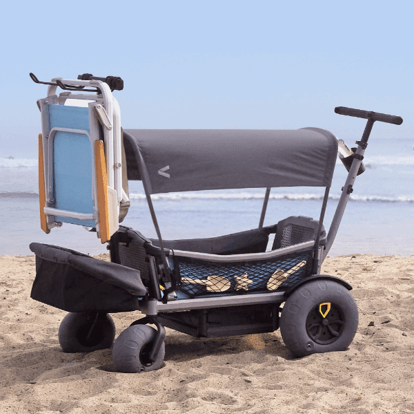 VEER Cruiser Sunshade stroller on the beach with canopy, cargo net, and large wheels