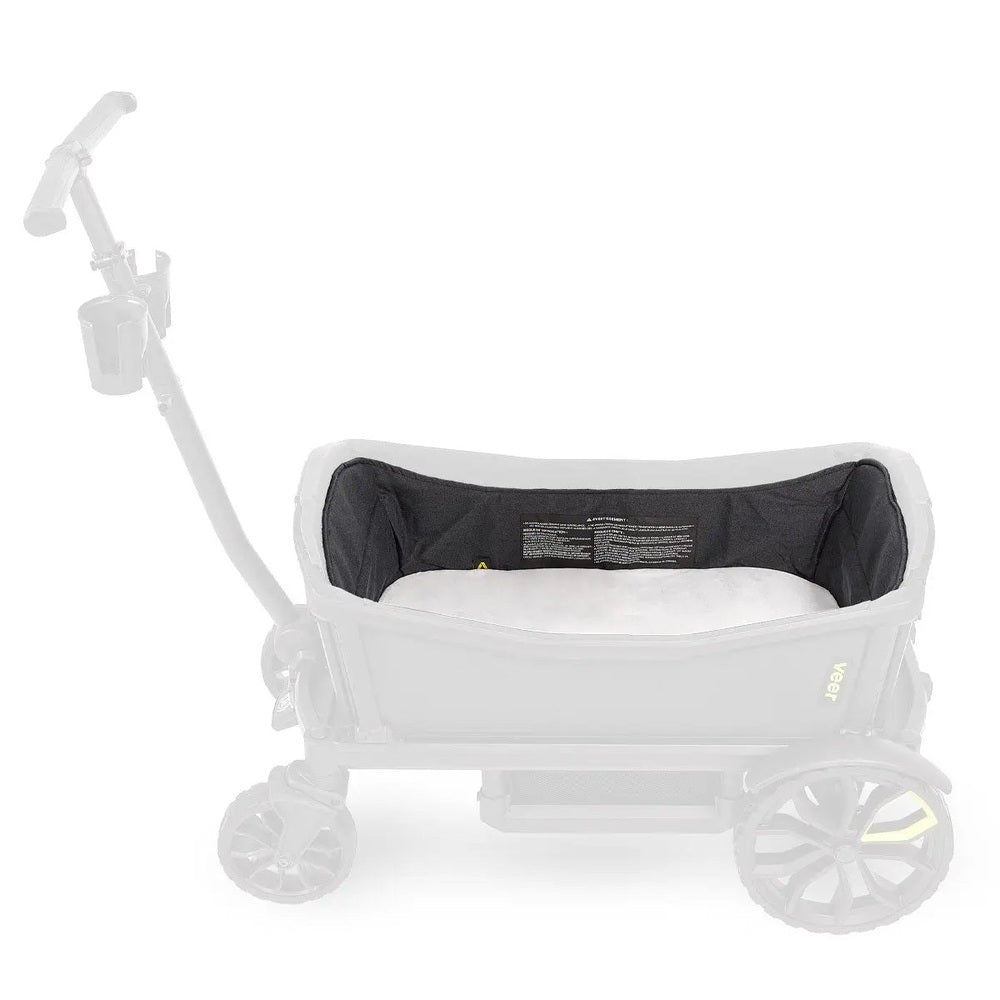 Veer Nap System on a VEER stroller, black interior liner inside a white frame with built-in cup holders.