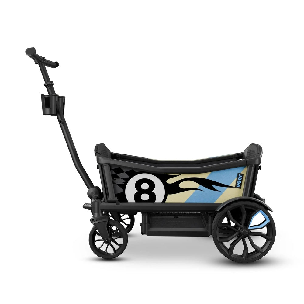 Veer Sidewall for Cruiser, black frame with bold blue panel, attached to a stroller with large rear wheels.
