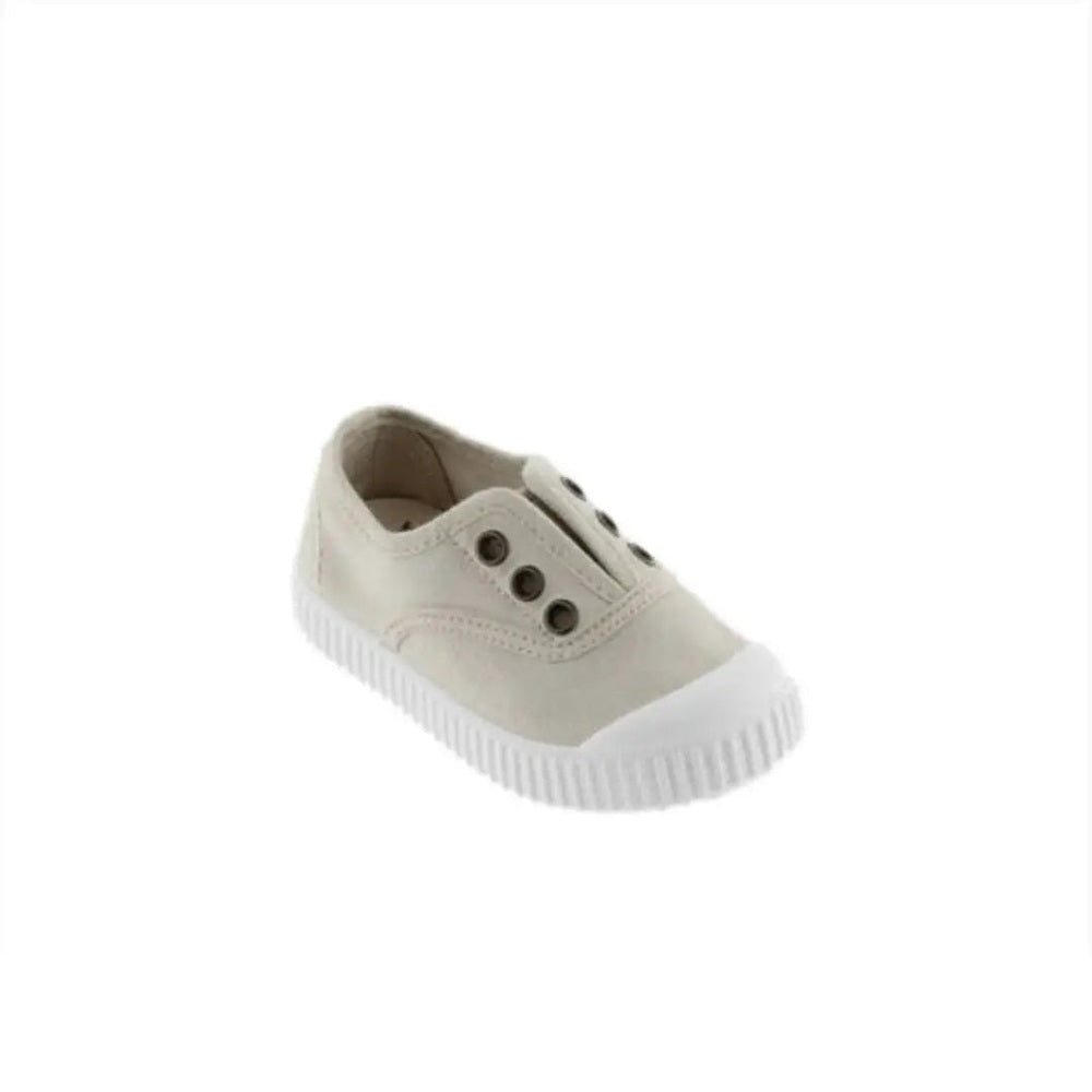 Victoria Shoes Rubber-Toecap Canvas Sneakers Hielo in beige canvas shown at an angled view with white rubber toe cap and ridged sole
