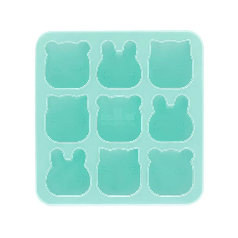 We Might Be Tiny Freeze&Bake Poddies silicone freezer tray with 9 mint‑green animal molds.