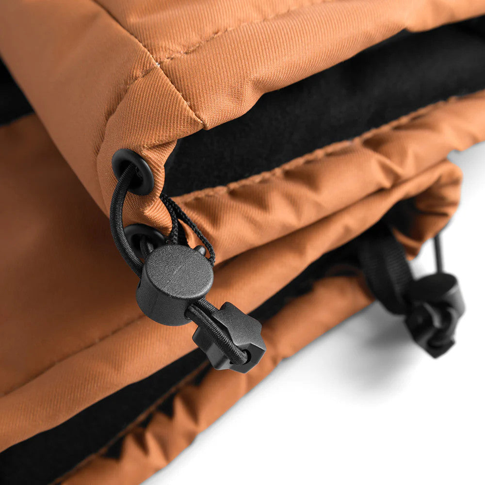 Weedo Foxdo Brown Gloves in warm brown fabric with a black drawcord toggle shown tightening the adjustable cuff.