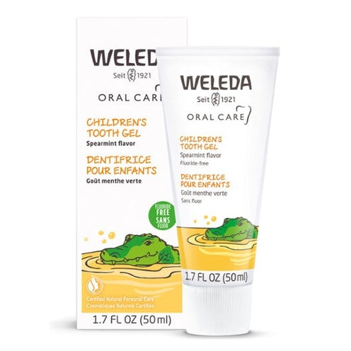 Weleda Children's Tooth Gel 50 ml tube beside box, spearmint flavor, fluoride-free, child-friendly packaging.