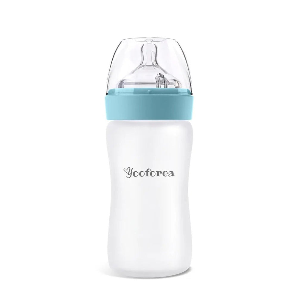 Yooforea silicone-coated glass baby bottle 9oz/270ml with turquoise cap, standing upright to show smooth, easy-grip body.
