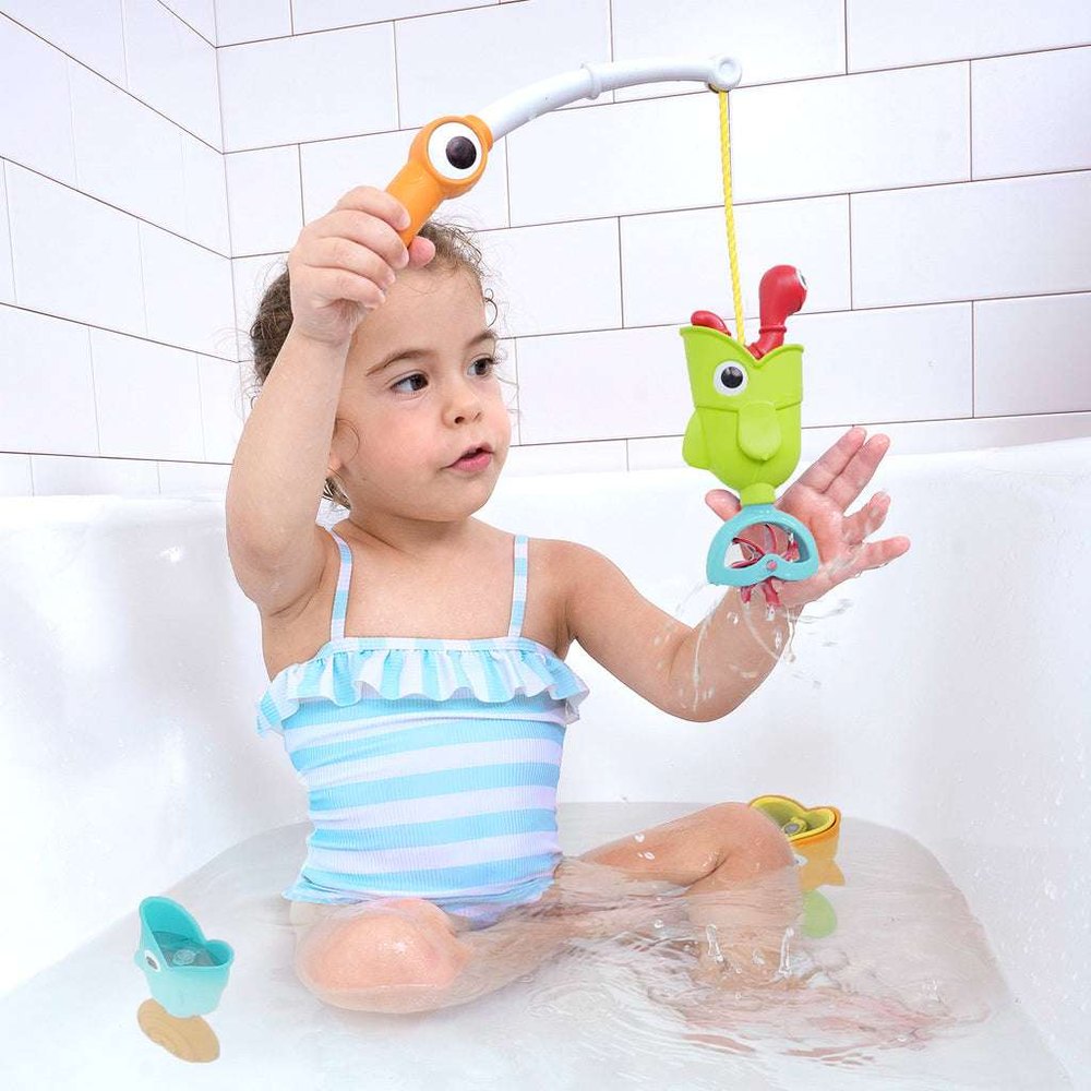 Yookidoo Catch N Sprinkle fishing bath toy set with orange rod and green fish in tub