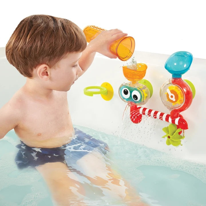 Yookidoo Spin 'N' Sprinkle Water Lab bath toy with colorful plastic fixtures and water stream for kids