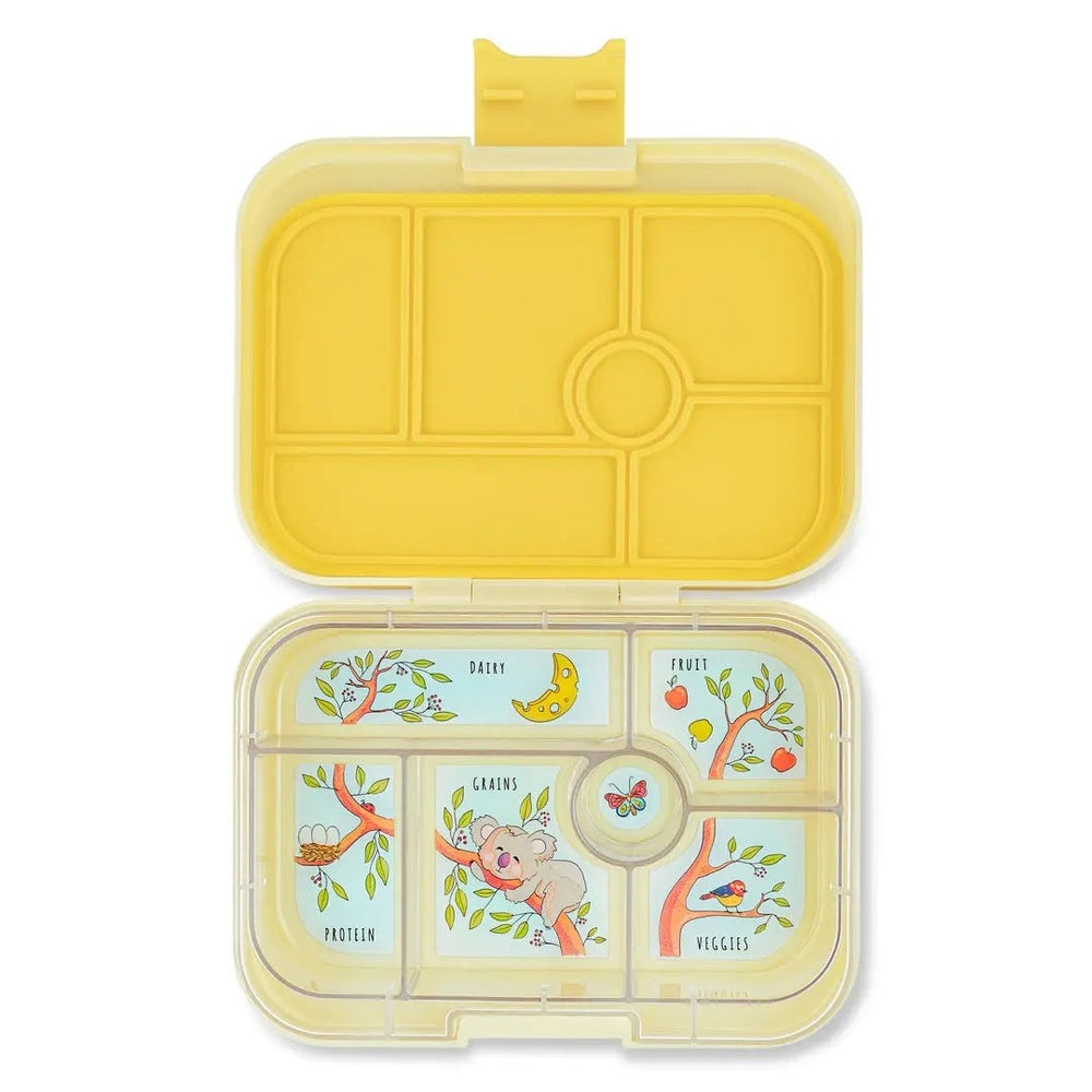 Yumbox Original 6-Compartment lunchbox, yellow, open to show illustrated sections for dairy, grains, fruit, veggies, protein.