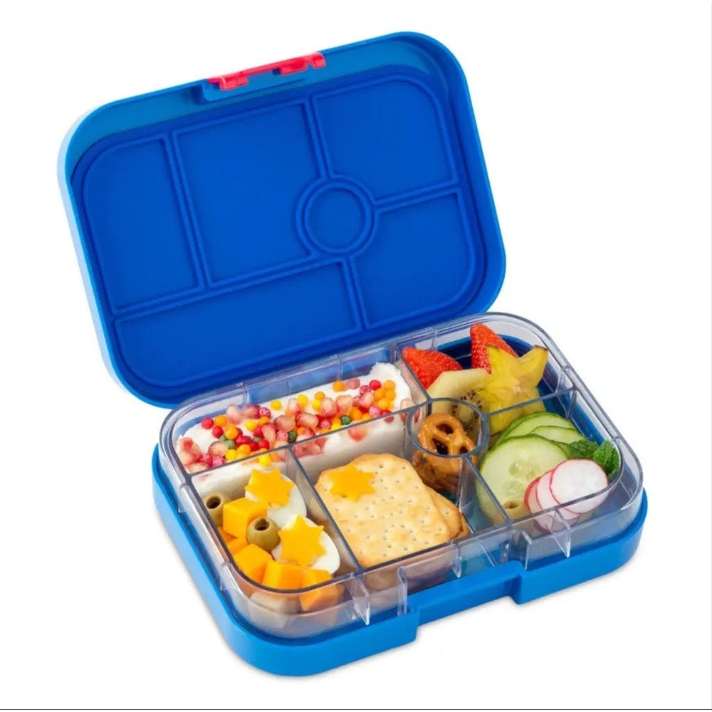 Yumbox Original 6-compartment lunchbox, blue, open to reveal six sections filled with fruits, crackers, cheese.