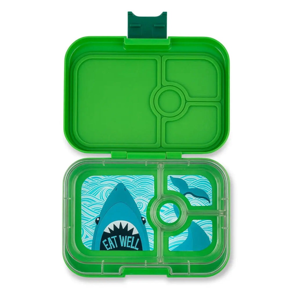 Yumbox Panino 4-compartment lunchbox in green, open to reveal ocean-pattern inserts and four sections.