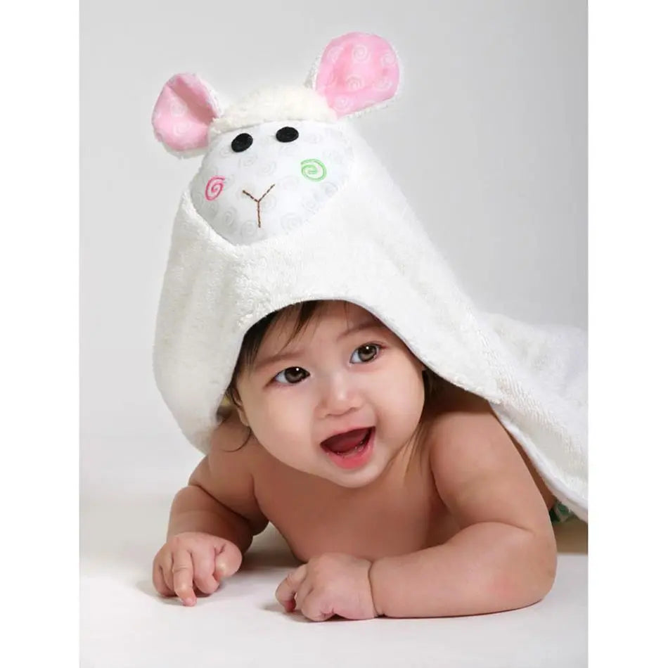 Zoocchini Baby Towel hooded bunny bath wrap, white plush with pink ears, baby happily crawls under the hood.