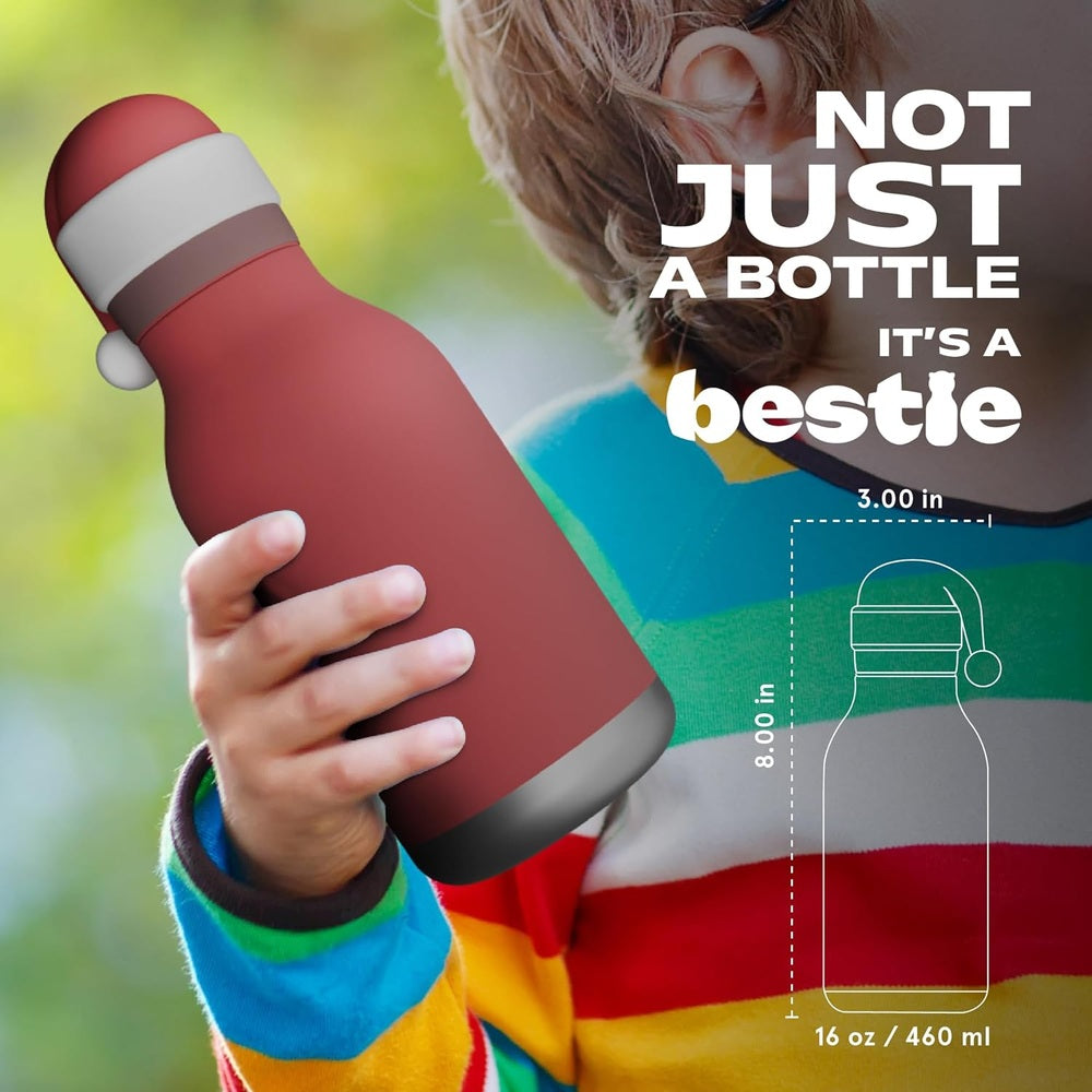 Asobu Bestie Holiday Bottle 16oz Santa, held by a child outdoors, showing festive red design and easy grip.