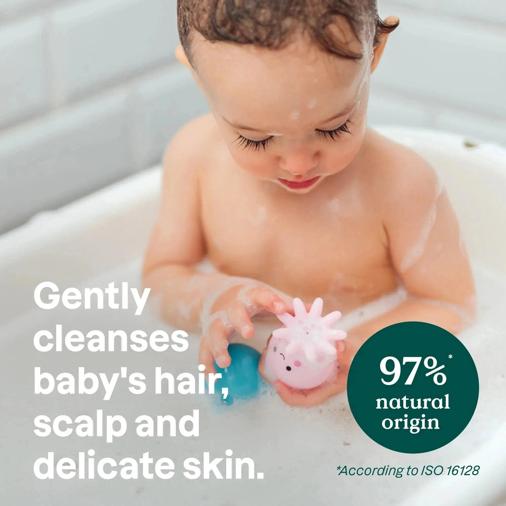 Attitude Baby Shampoo and Body Wash in bath; baby gently cleanses hair and skin with foam, 97% natural origin