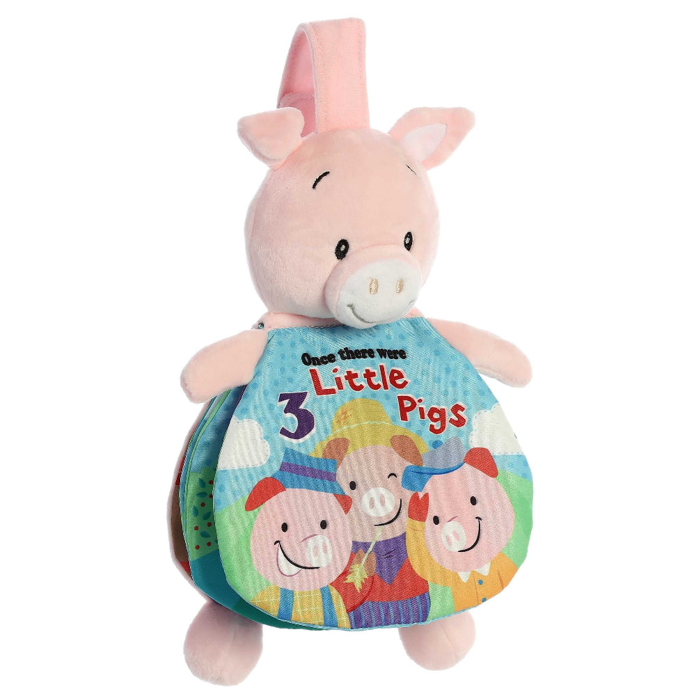 Aurora Ebba Story Pals 3 Little Pigs plush with pink body and colorful backpack book