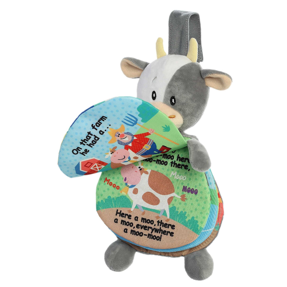 Aurora Ebba Story Pals Old MacDonald stuffed cow plush with colorful farm print

