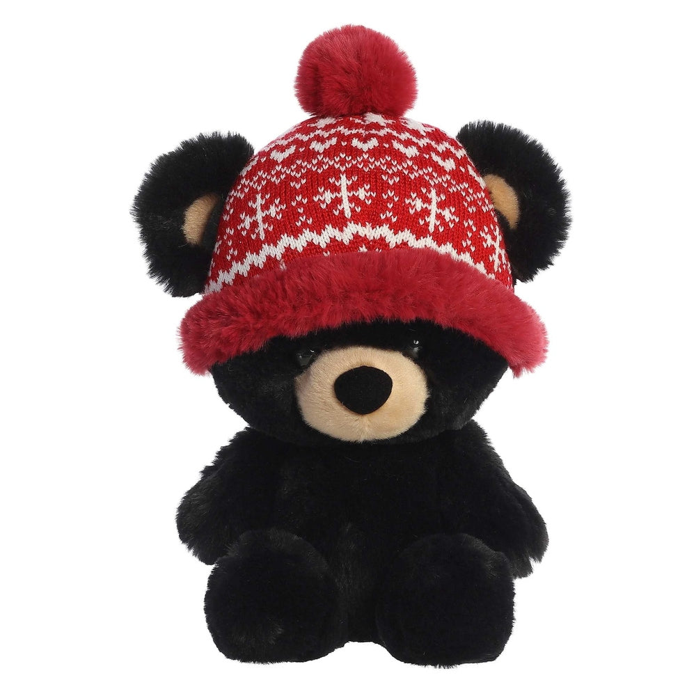 Stuffed bear Aurora Holiday Baby Bear Bucky 13in in black plush with red knit hat and pom.