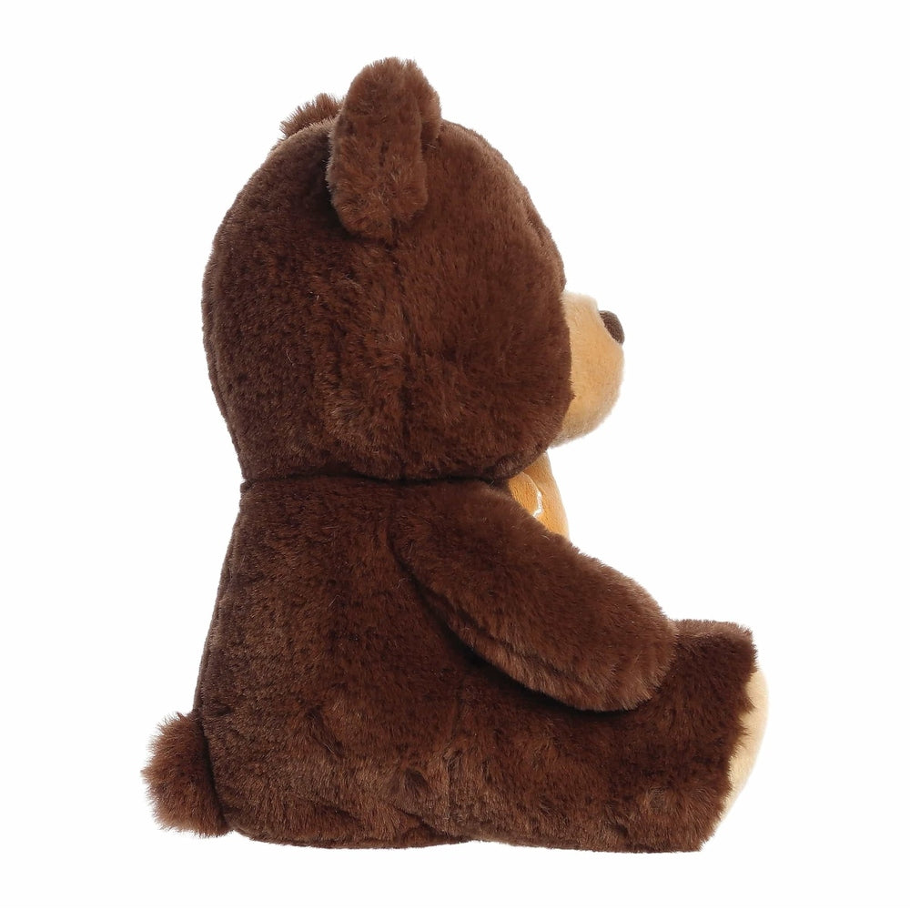 Aurora Holiday Barista Bear Gingerbread Man 10" plush toy, brown fur, seated with arms resting.