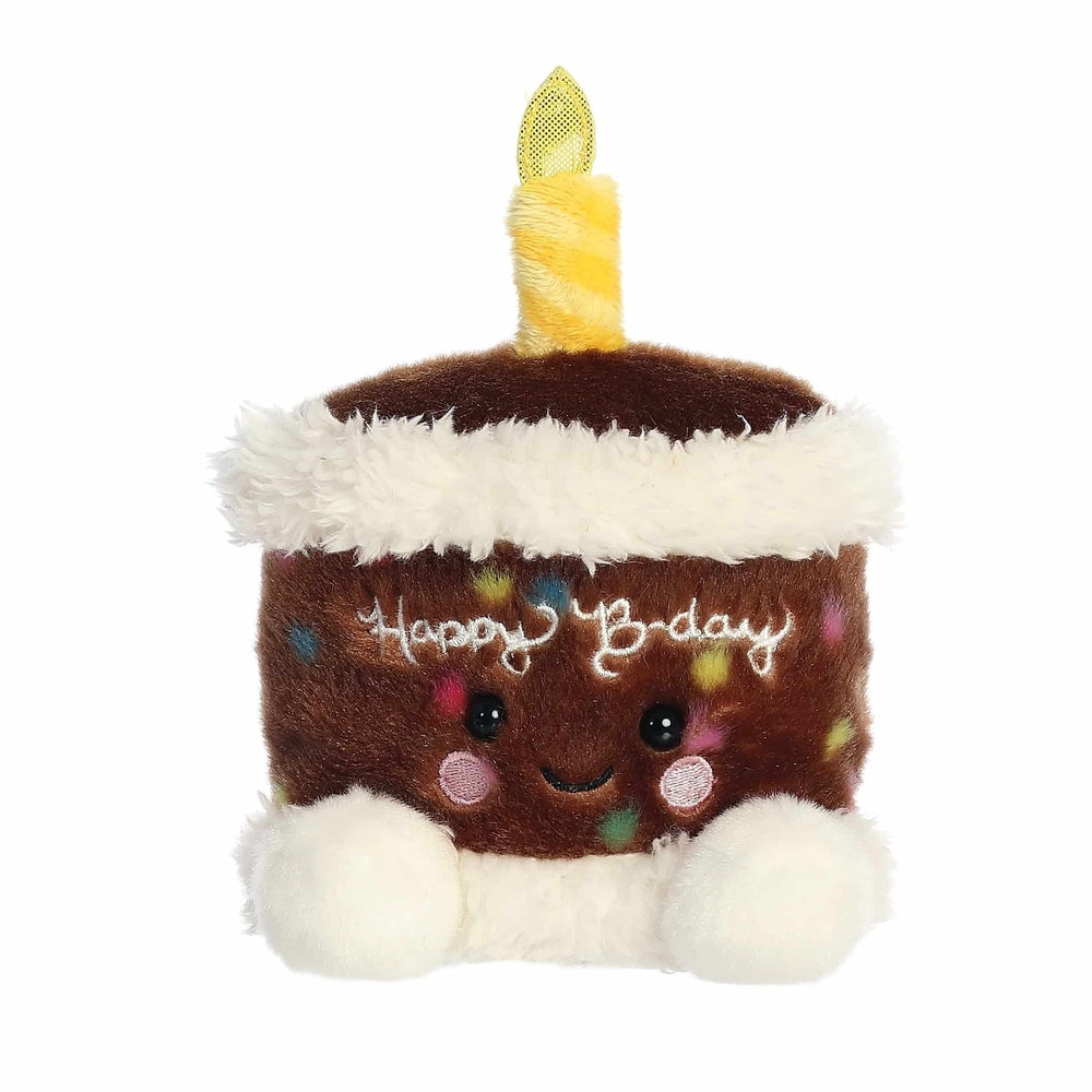 Aurora Palm Pals Choco Birthday Cake stuffed plush toy, brown cake with white frosting, yellow candle