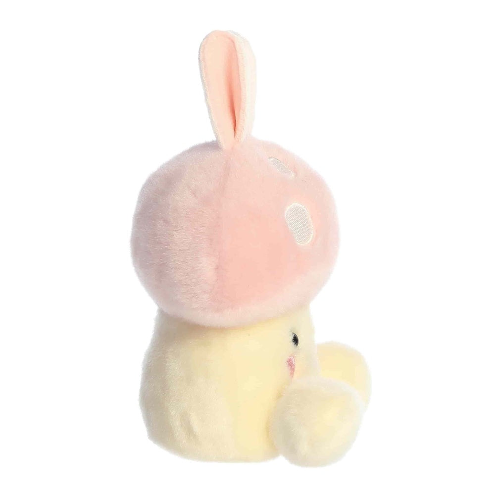 Aurora Palm Pals Diana Bunny plush toy, pink head with ears and pale yellow body, 5-inch stuffed animal.