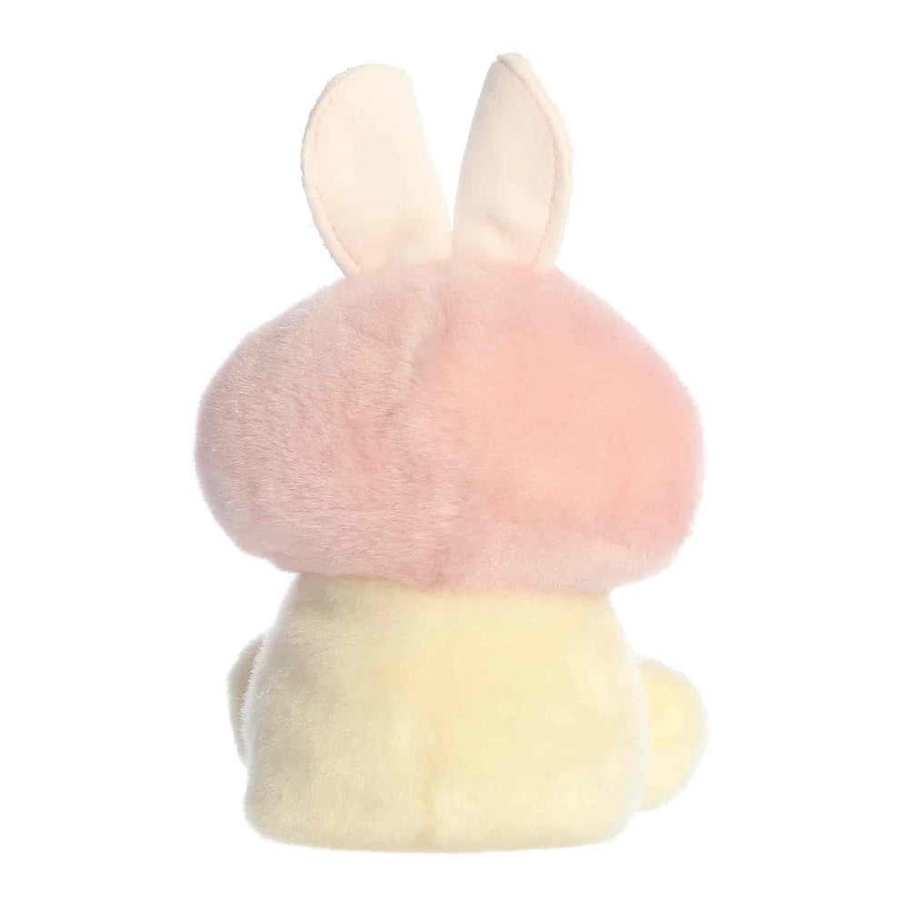 Aurora Palm Pals Diana Bunny plush toy, soft pastel pink head and cream-yellow body, 5 inches