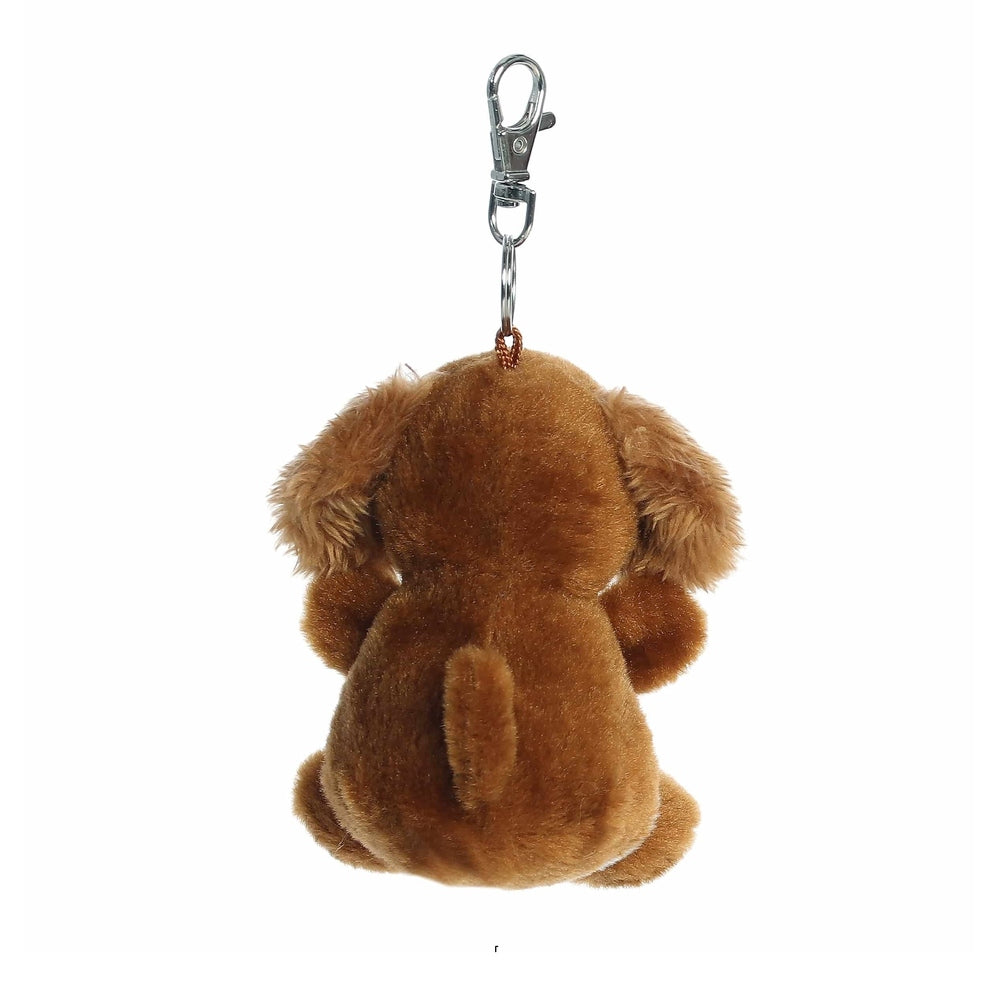 Aurora Palm Pals Lady Spaniel Clip-On 4" brown plush dog with a metal clip at the top ready to attach to a bag