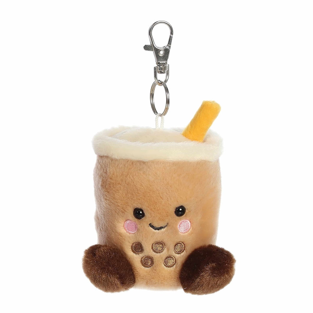 Aurora Palm Pals Milky Tea Boba clip-on plush cup with cream rim, yellow straw, cute face and brown pearls