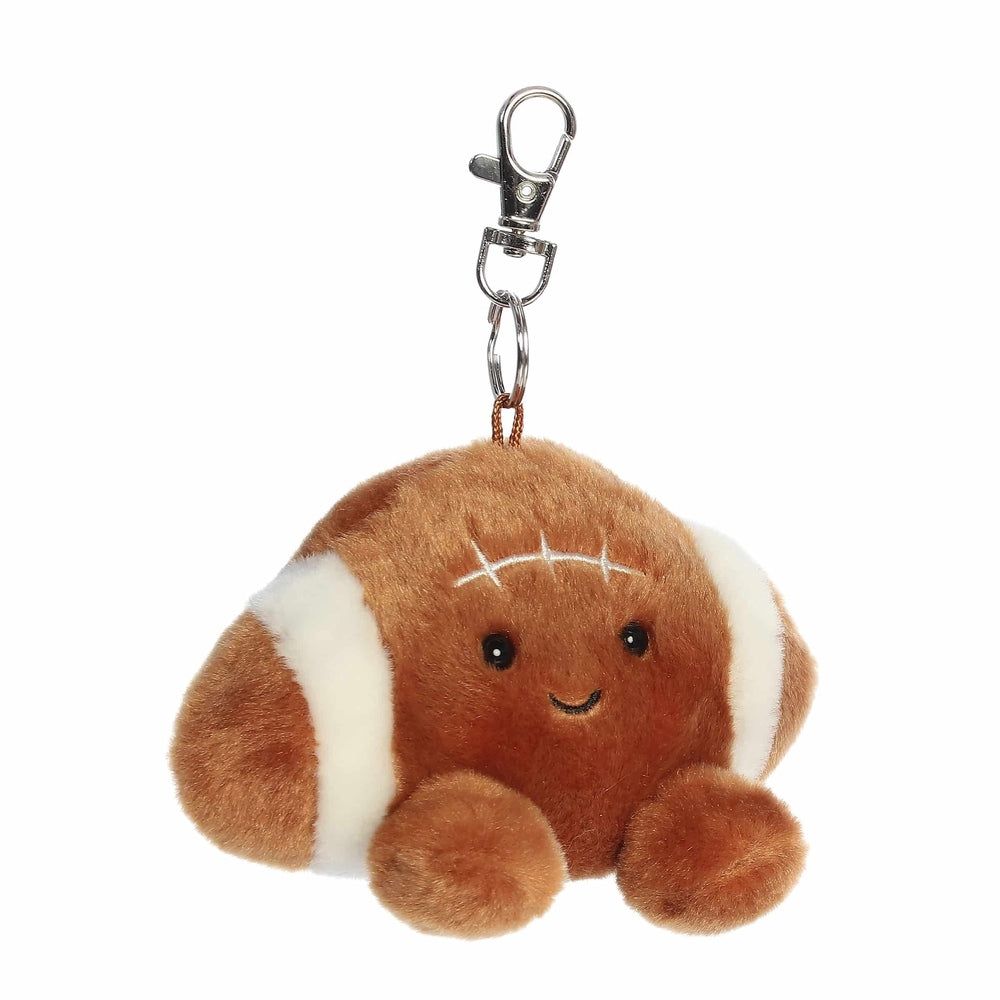 Aurora Palm Pals tackle football clip-on plush toy, brown with white stripe accents, 4 inches