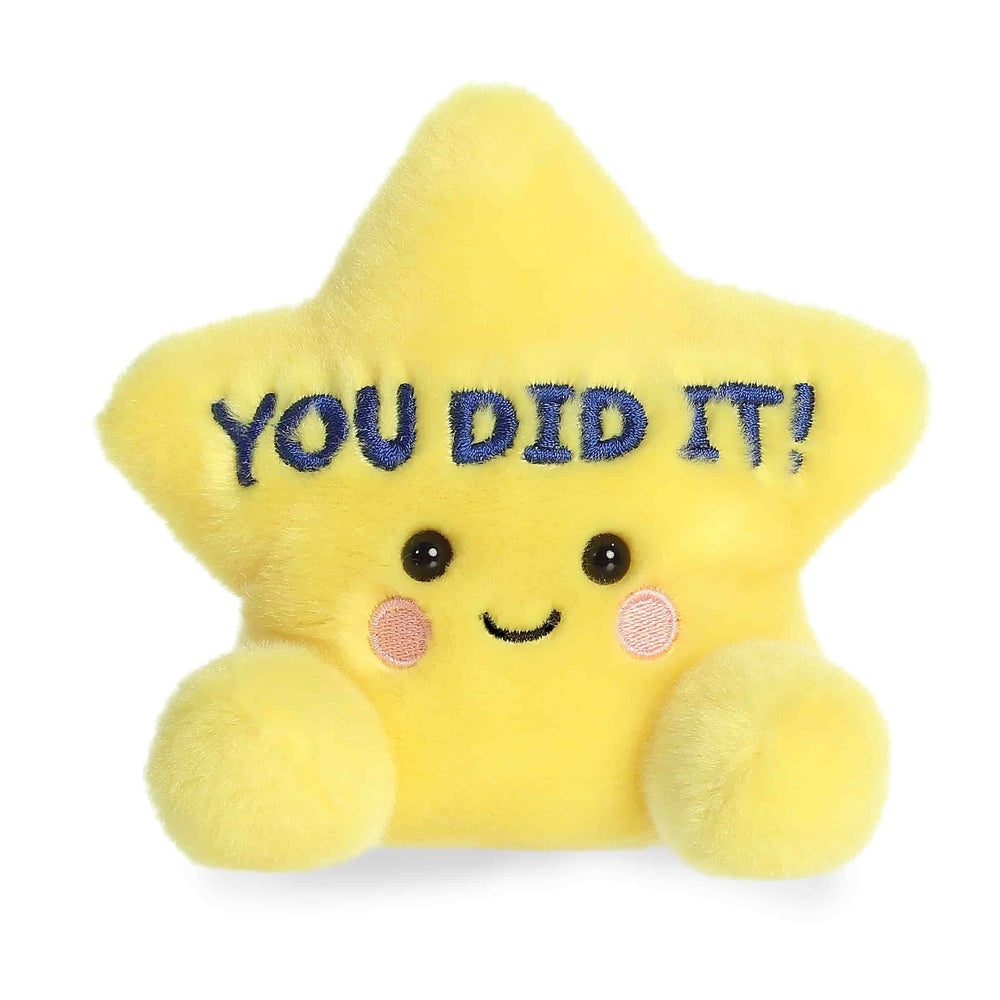 Aurora Palm Pals You Did It Star 5in plush toy, yellow star with blue embroidery, cute face and pink cheeks