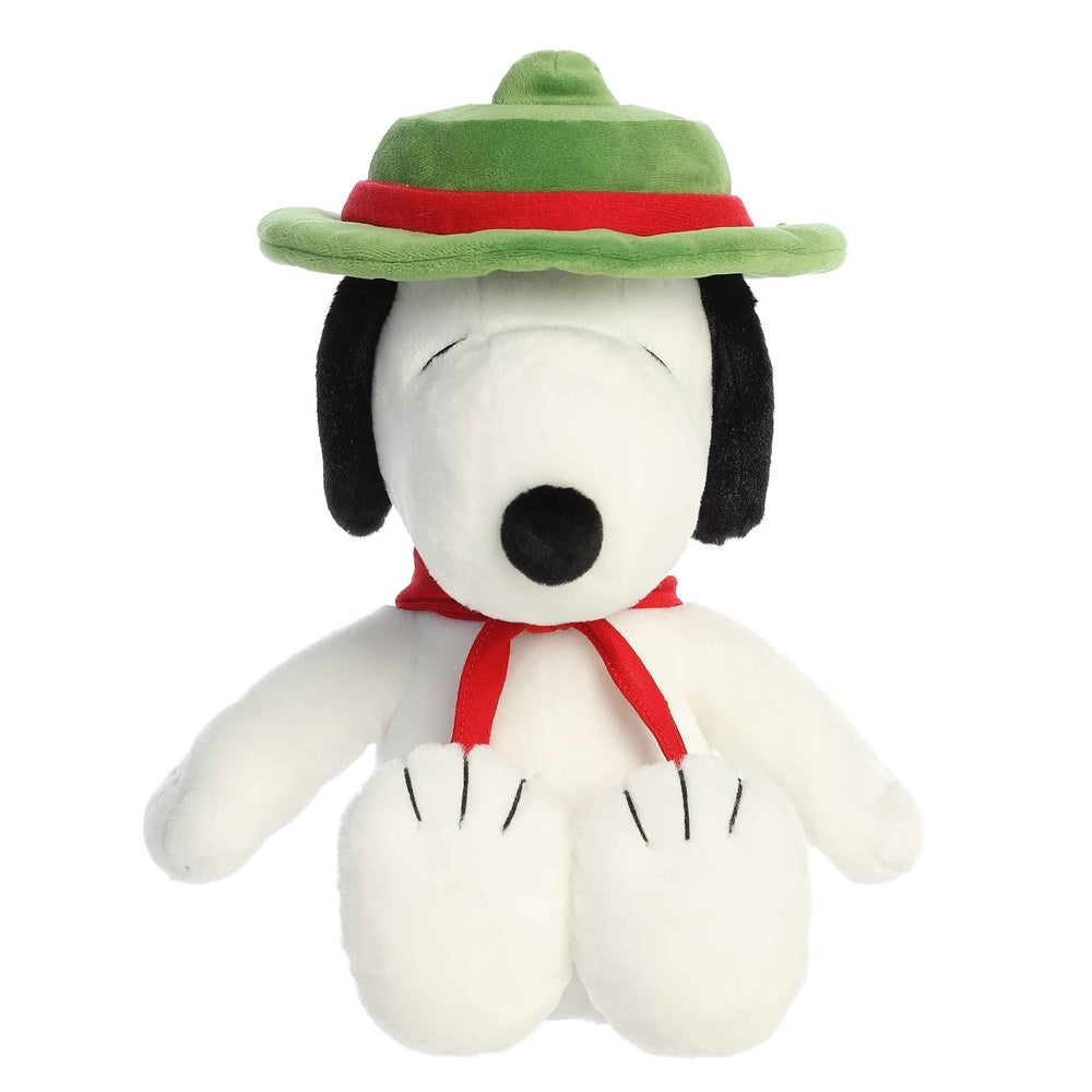 Snoopy Beagle Scout plush by Aurora; white dog with black ears, green hat with red band, red scarf.