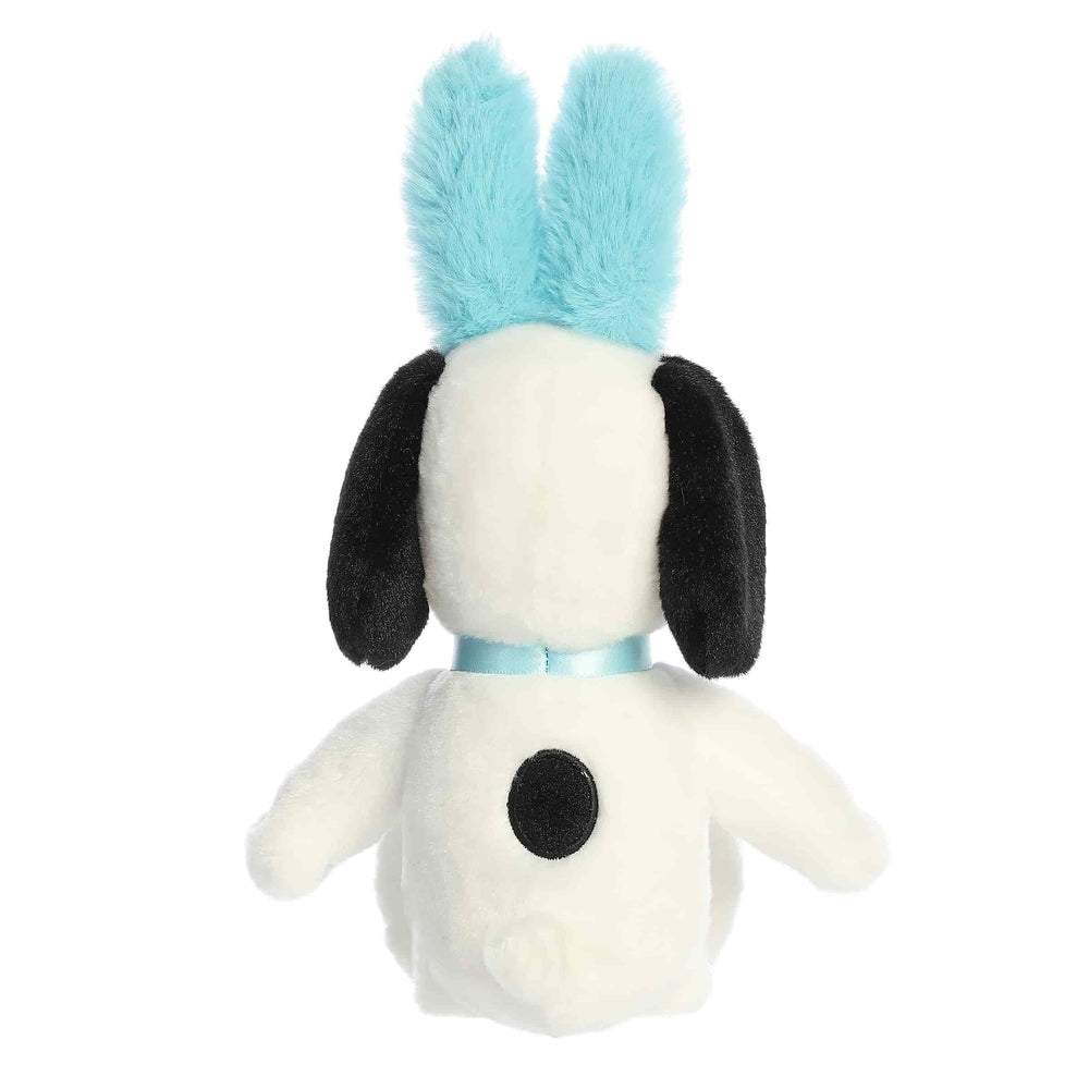 Aurora Snoopy Easter plush toy, white dog with black ears, aqua bunny ears and collar, back view.
