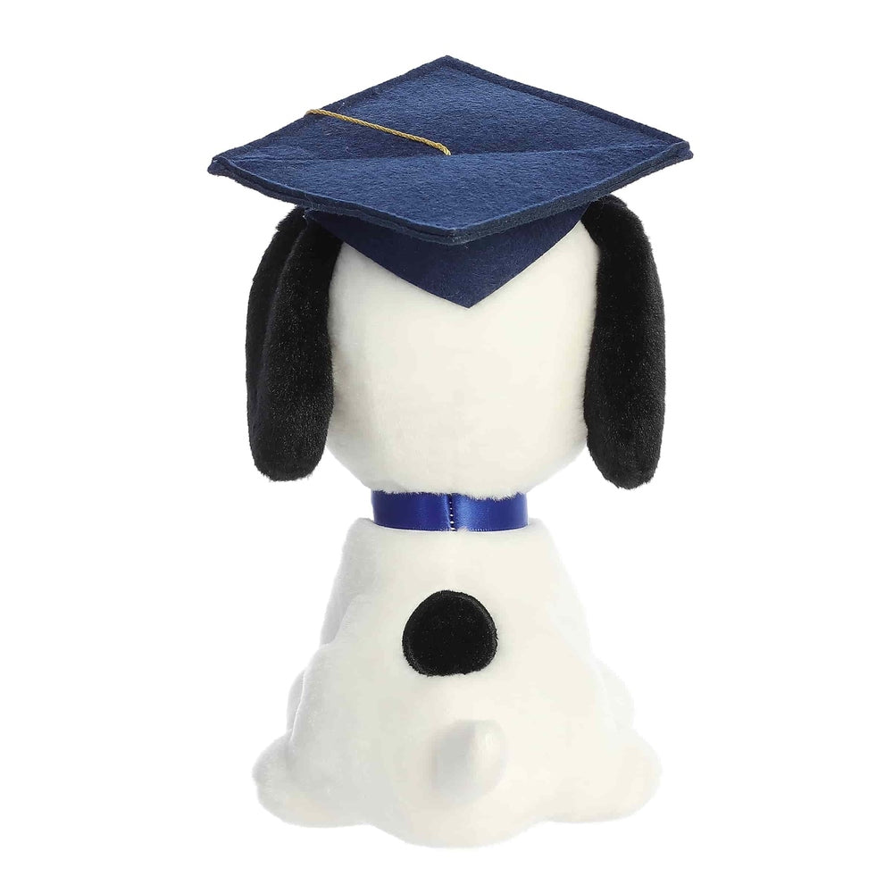 Aurora 9-inch Snoopy plush wearing blue graduation cap and collar, white body with black ears
