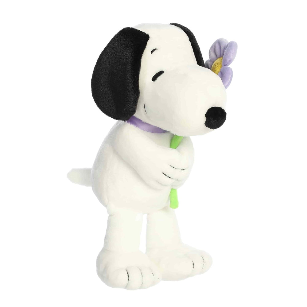 Aurora Snoopy 11-inch plush stuffed animal, white dog with black ears, purple flower and green stem.
