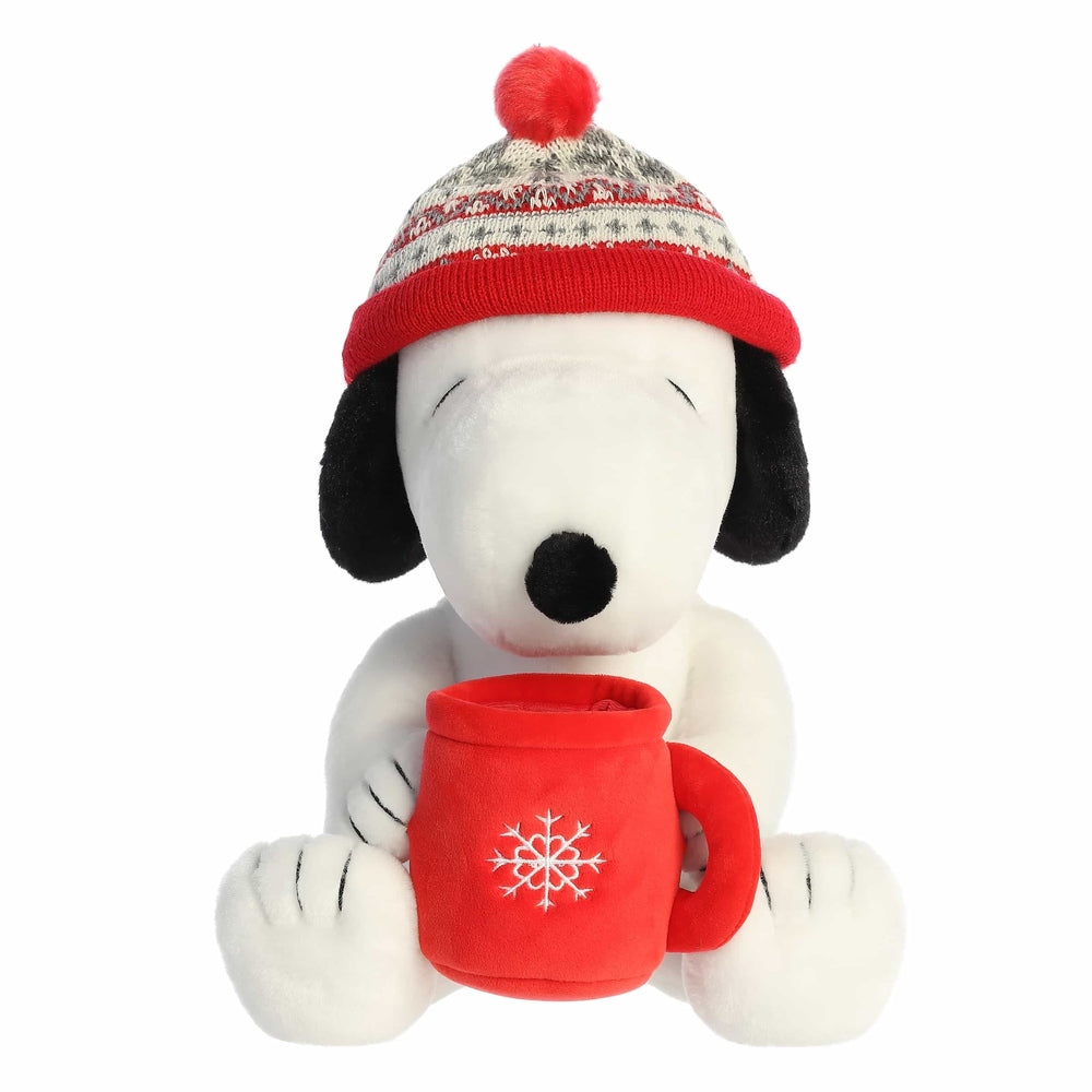 Aurora Snoopy 12-inch plush wearing a red knit winter hat and holding a red mug with a snowflake.