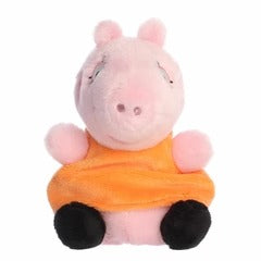 Aurora Mummy Pig Palm Pals stuffed toy, 5 inches, pink plush with orange dress.