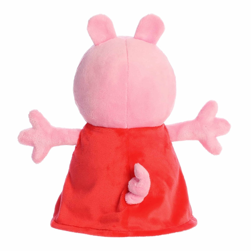 Peppa Pig stuffed animal by Aurora; pink plush with red dress, back view